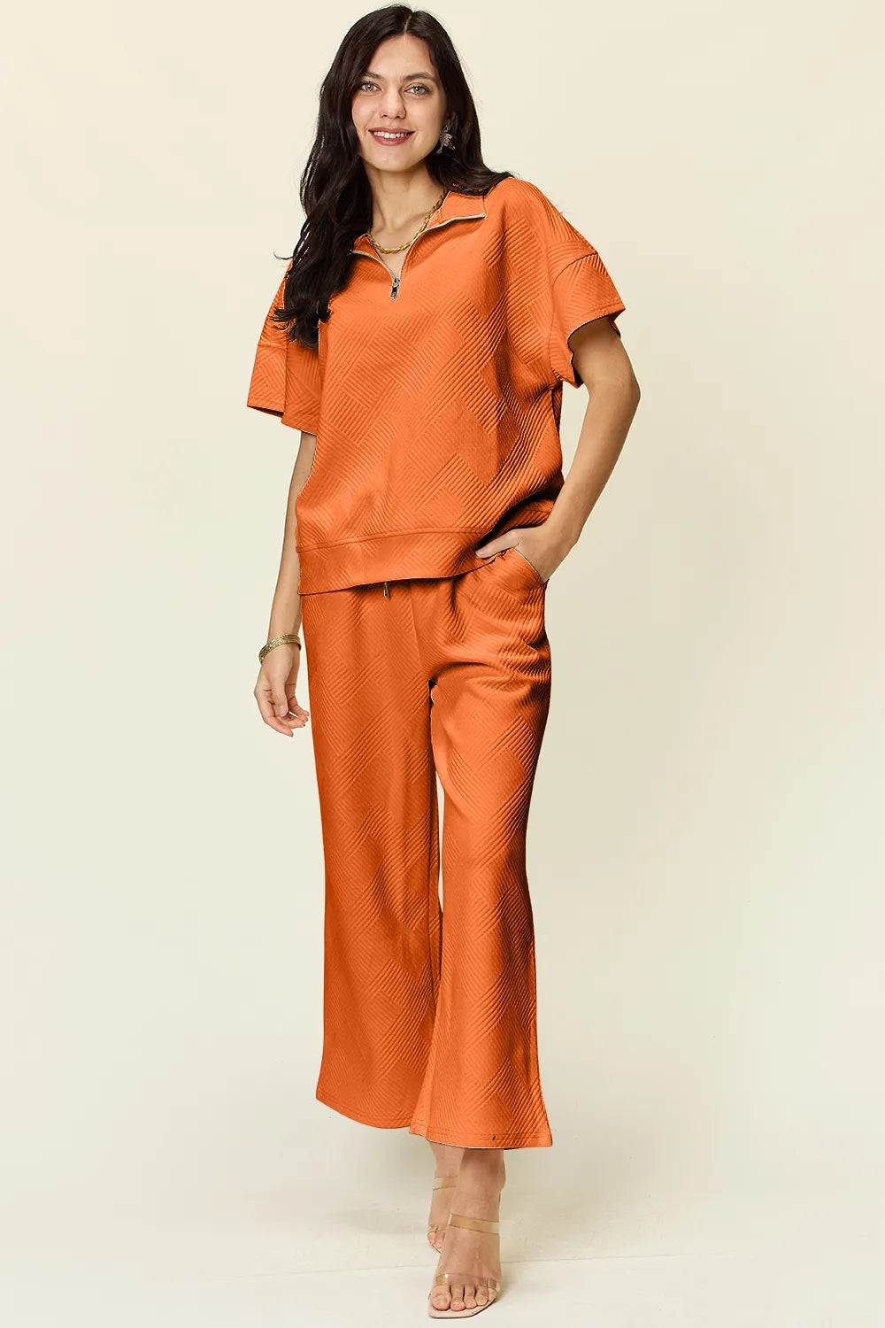 Double Take Full Size Texture Half Zip Short Sleeve Top and Pants Set Tangerine