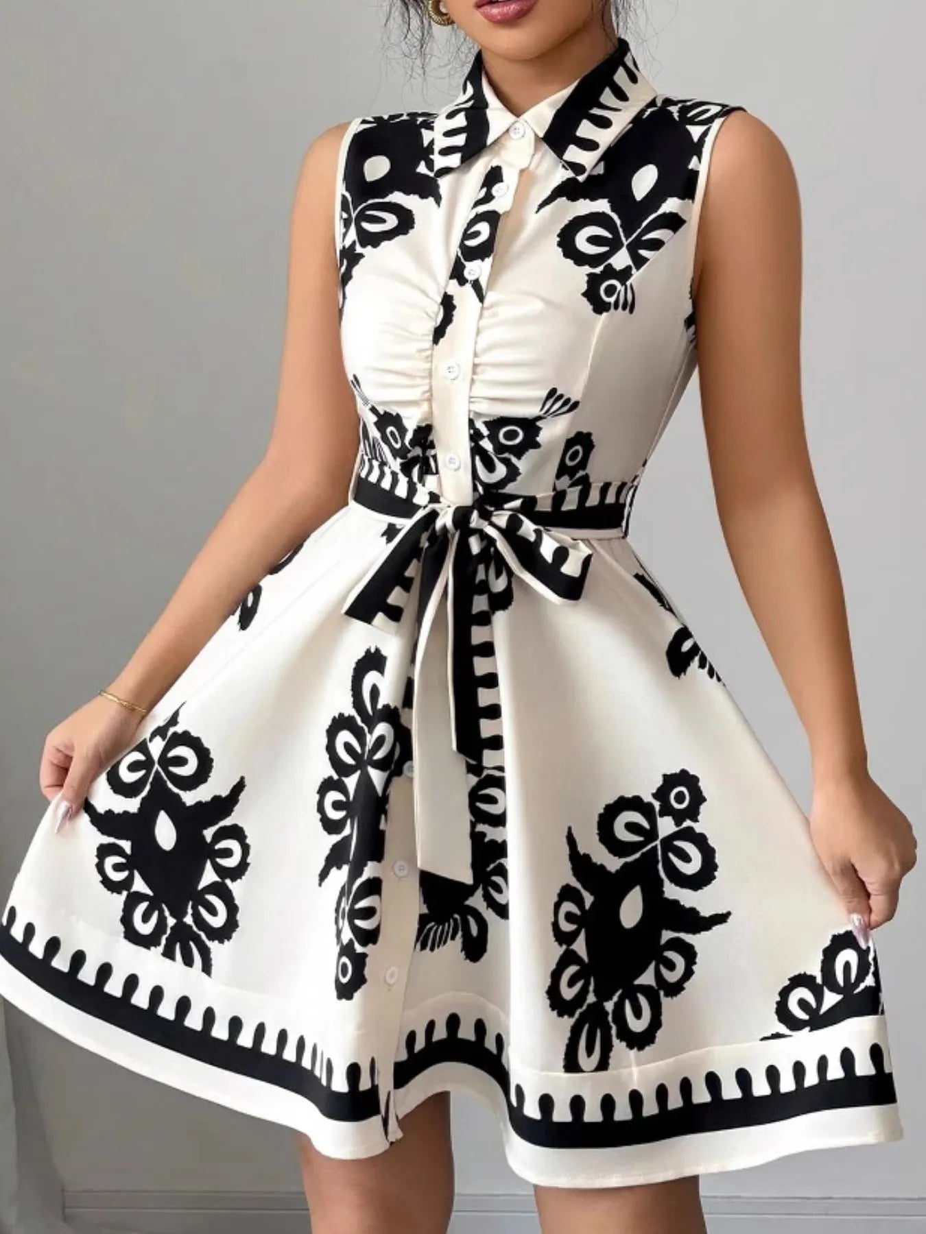 Printed Sleeveless Tie Waist Mini Dress