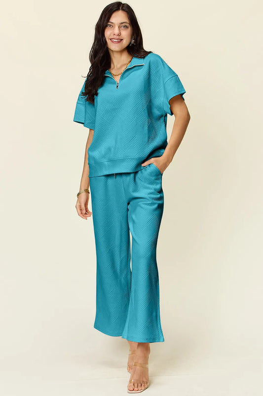 Double Take Full Size Texture Half Zip Short Sleeve Top and Pants Set Light Blue